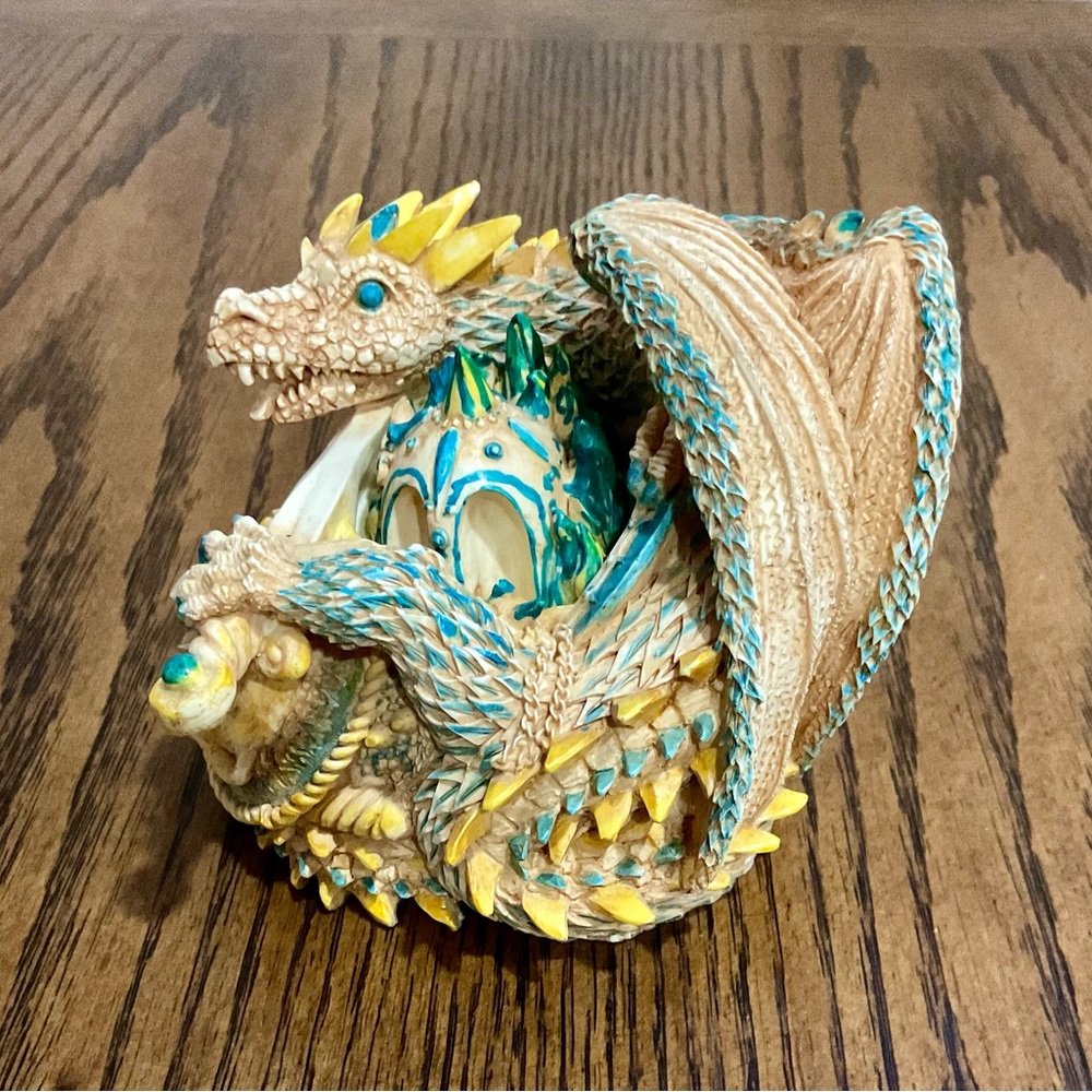 Ceramic dragon figurine with sword & covered hiding place